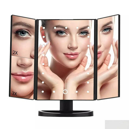 Detalj ogledala za šminkanje prikazuje lampice i kontrolu na dodir.