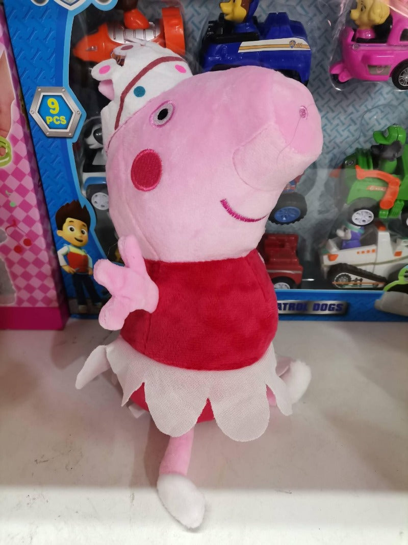Mama i tata iz porodice Pepe Prase kao plišani likovi.