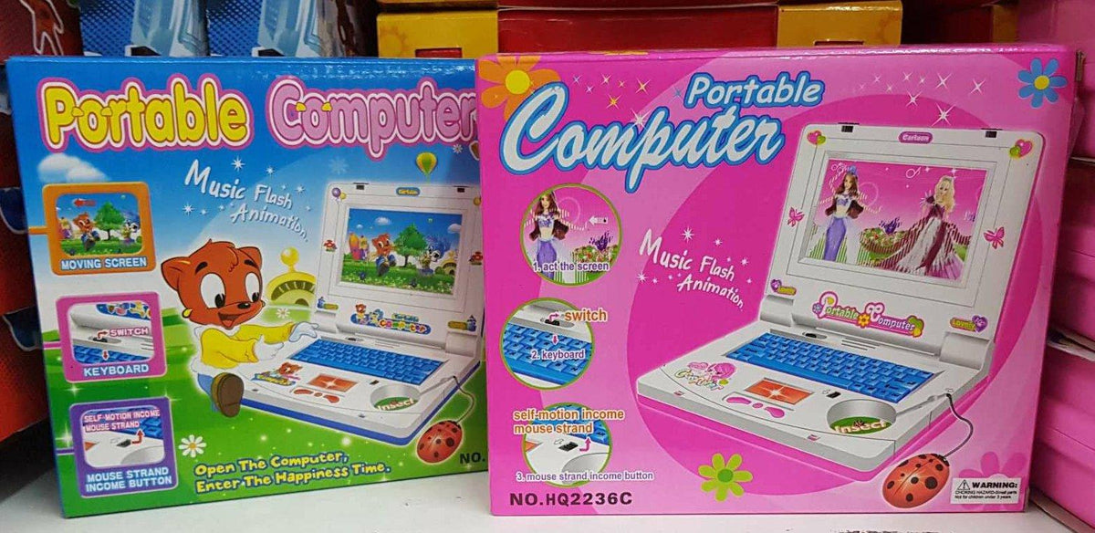 Na fotografiji se vidi dečja muzička igračka u obliku roze laptopa.