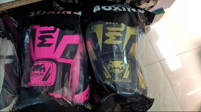 Rukavice za boks dimenzija 25 × 15 cm u roze boji.