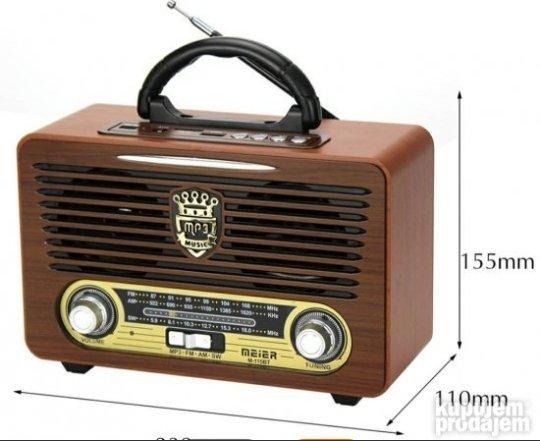 Radio retro izgleda prikazan kao glavni proizvod na slici.
