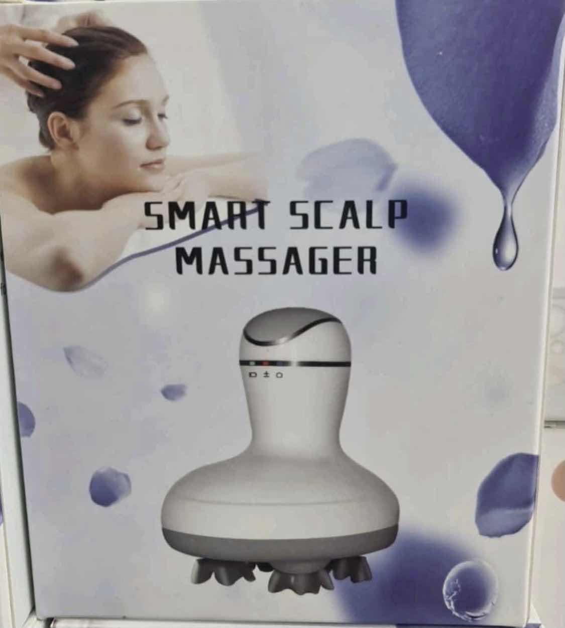 Masažer za glavu, namenjen nezi skalpa i opuštanju.