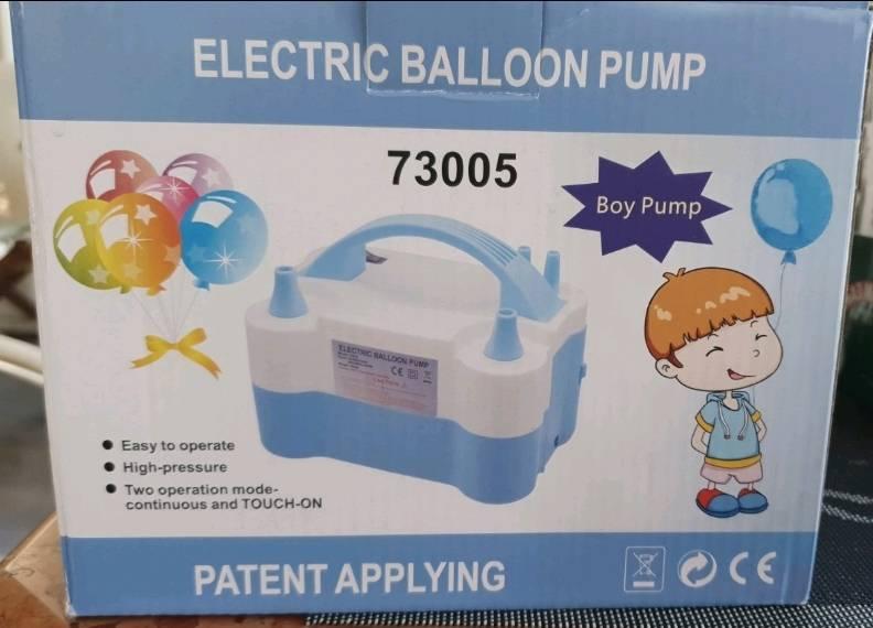 Električna pumpa namenjena naduvavanju balona za dekoracije.