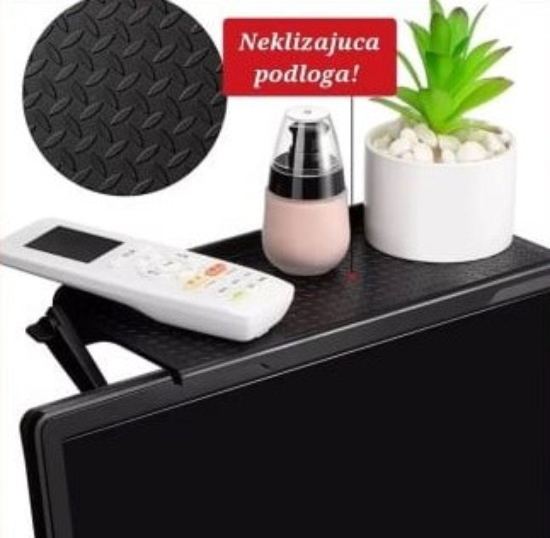 Polica sa nosivošću do 2 kg za sitnu opremu.