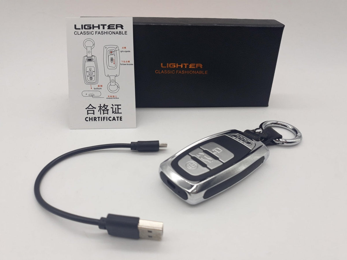 USB uređaj sa oznakom AUDI predstavljen kao privezak.