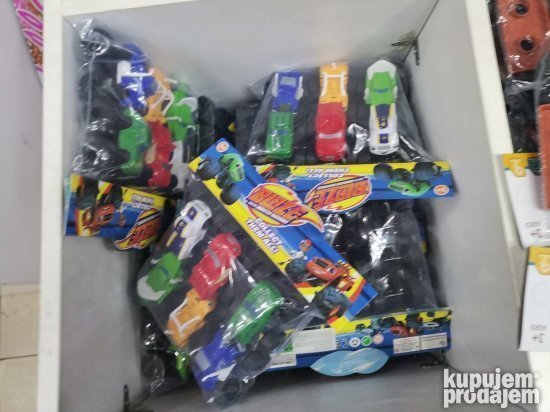 Zeg ima zeleni izgled sa motivom dinosaurusa.