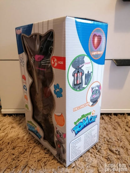 Plišani mačak Talking Tom sa svetlećim srcem.