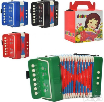 Prikazan je instrument za dečju muzičku igru: harmonika PRODAVANI.