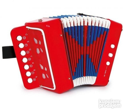Dečija harmonika PRODAVANI prikazana je kao instrument za muzičku igru.