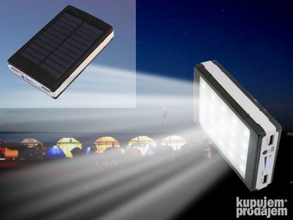 Solarni punjač PRODAVANI prikazan kao dodatak za telefon.