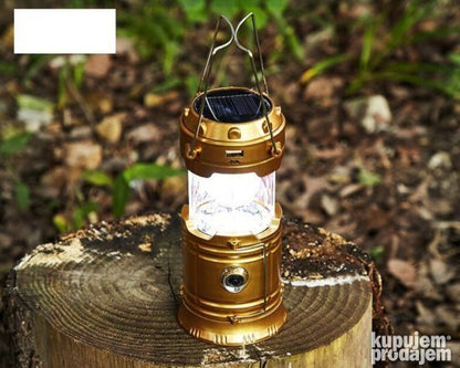 LED kamperska lampa prikazana je u fenjerskom obliku za osvetljavanje prostora.