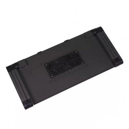 Sklopivi sto za laptop koji se može skloniti kada se ne koristi.