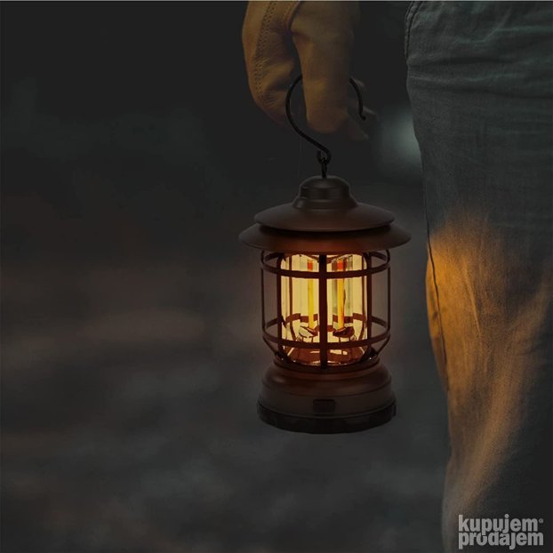 Punjiva lampa prikazana je sa metalnom kukom za postavljanje.