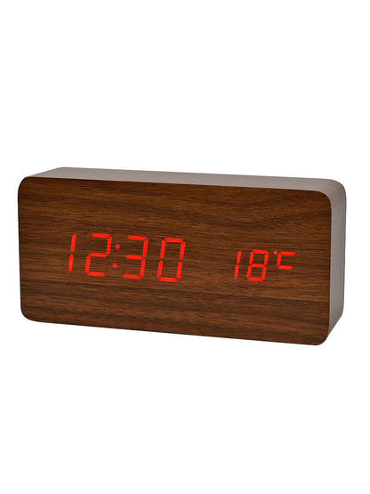 Smeđi digitalni alarm sat PRODAVANI prikazan je kao detalj za dom.