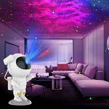Astronaut-projektor sa tri dugmeta na zadnjoj strani.