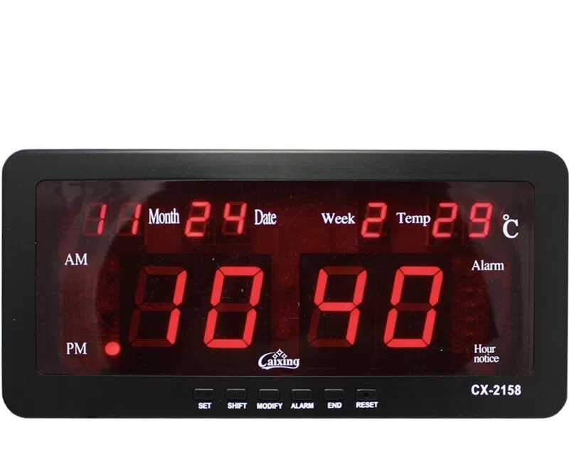 Stoni LED digitalni sat prikazan kao uređaj za prikaz vremena.