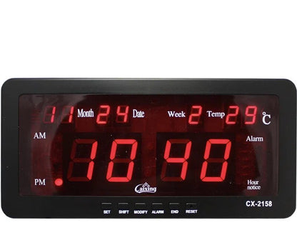 Stoni LED digitalni sat prikazan kao uređaj za prikaz vremena.